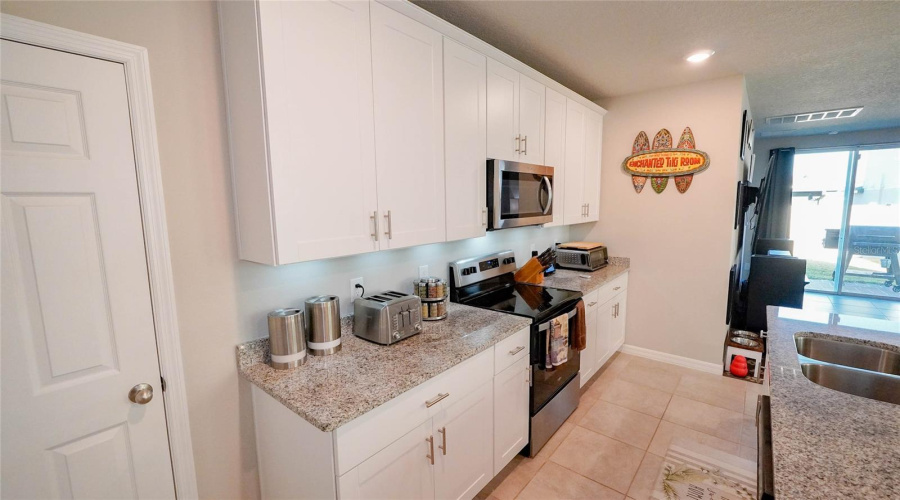 All These Cabinets Are Sure To Store Lots Of Items!  In Addition, You Have The Pantry Behind The Door On The Left.