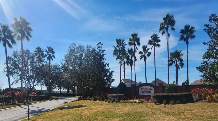 Welcoming entrance to the subdivision, showcasing the well-maintained and inviting community.