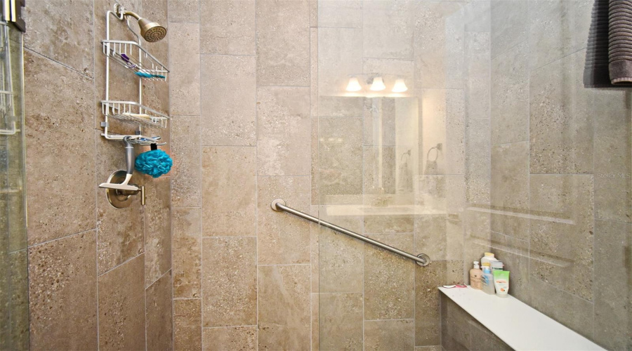 Walk-in Shower with floor to ceiling tile
