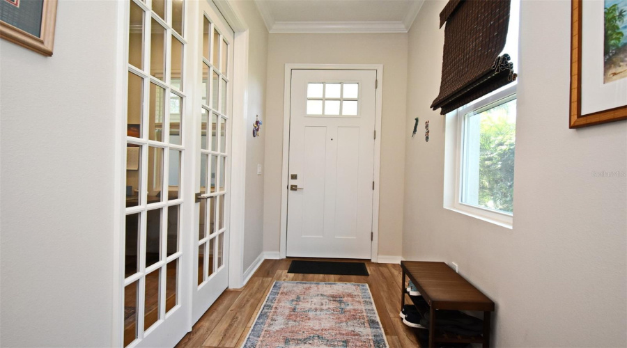 Hallway with Glass Panel Doors to Home Office