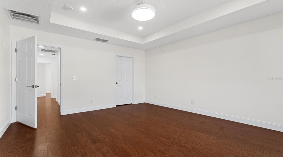 Primary Bedroom With Tray Ceiling