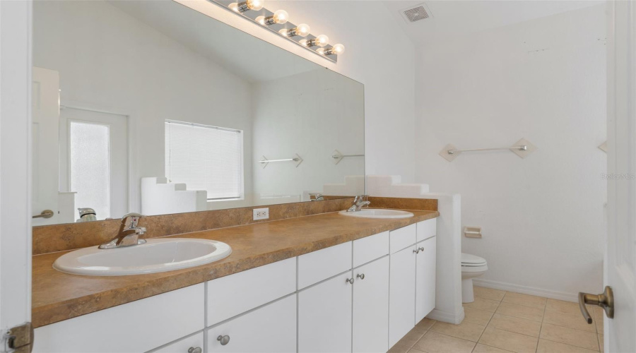 DAVENPORT, Florida 33837, 4 Bedrooms Bedrooms, ,3 BathroomsBathrooms,Residential,For Sale,VINE DR,0,MFRTB8348007
