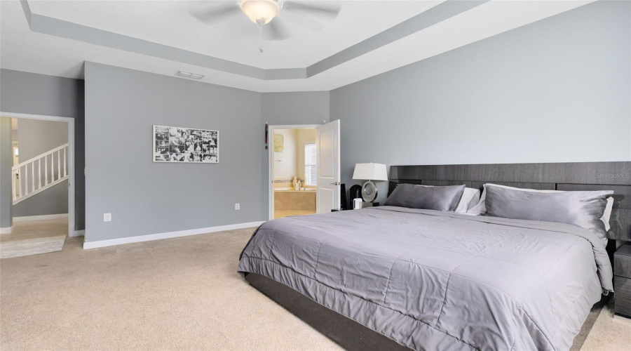 Primary bedroom with en-suite bathroom.