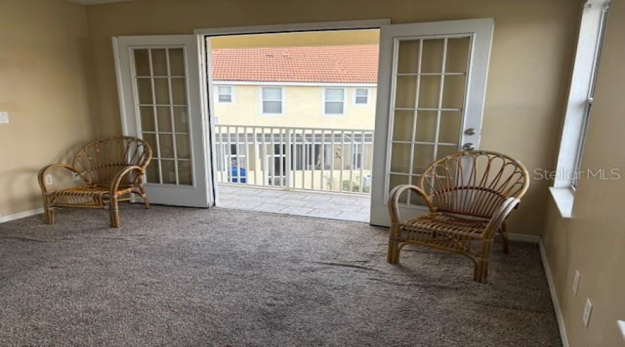 Upstairs Primary Suite With Balcony Over Looking Water View