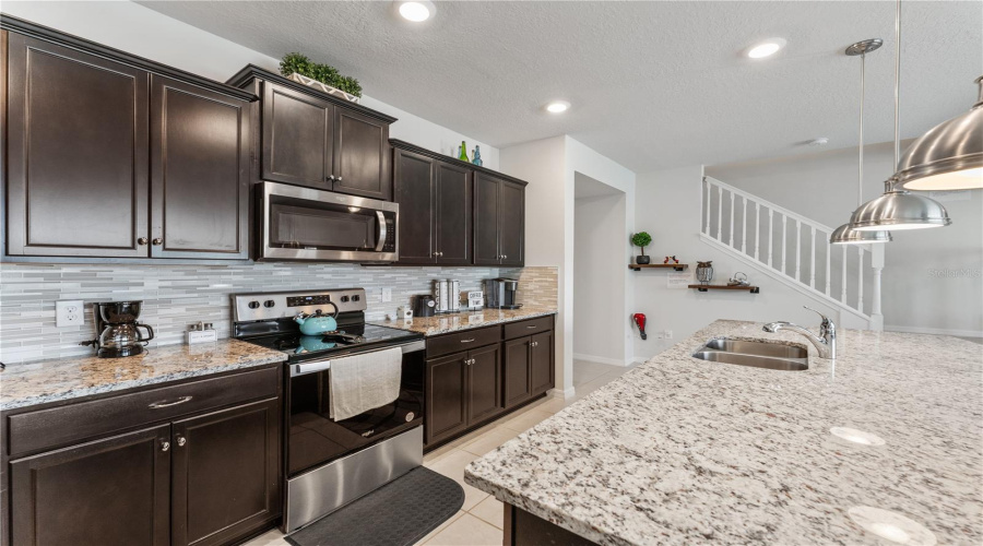 Cabinets And Extended Island Countertop