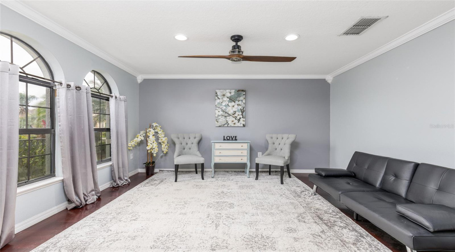 Living Room Has Many Windows To Allow Natural Lightening