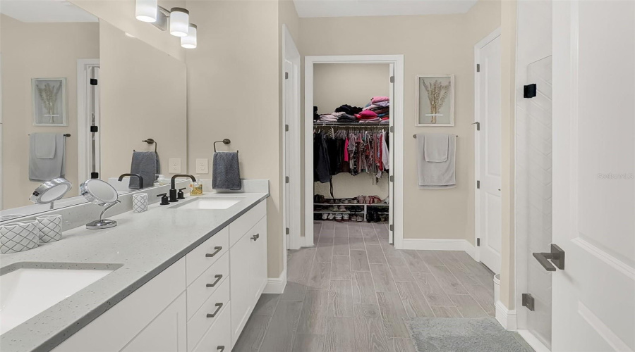 Primary Bathroom With Walk-In Closet