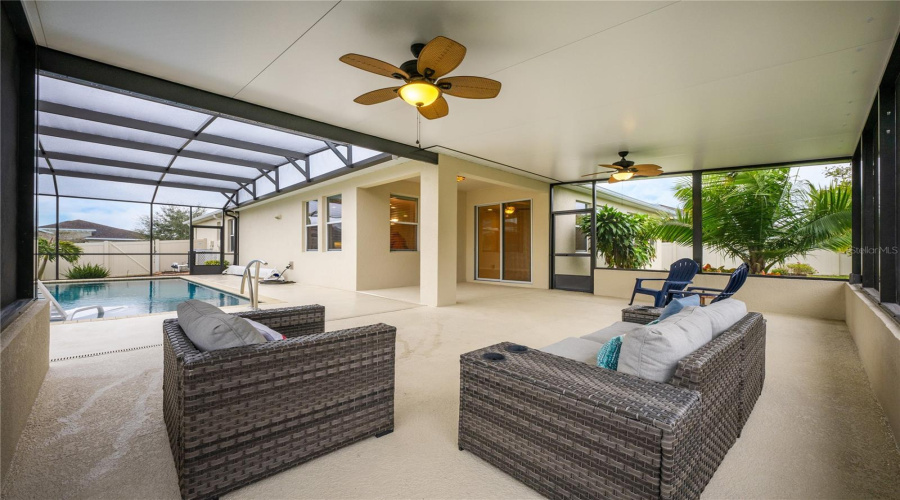 The Cherry On Top Is The Massive Screened Lanai, Perfect For A Relaxing Weekend With Family Or Cookouts With Friends, It Is Ideally Situated To Enjoy The Heated Salt Water Pool Complete With A Sun Shelf To Soak Up Some Vitamin D!