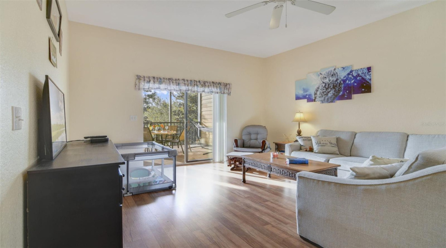 Living Room look toward Large Screened Balcony