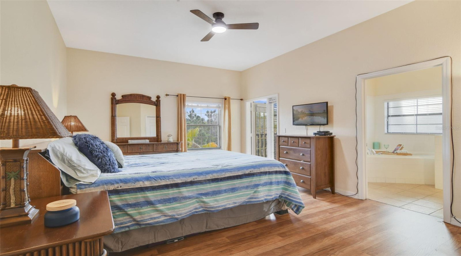 Primary Bedroom looking toward Small Screened b     Balcony - with new Paddle Fan