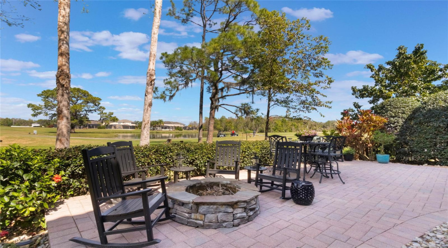 Just Outside The French Doors Is This Cozy Fire Pit