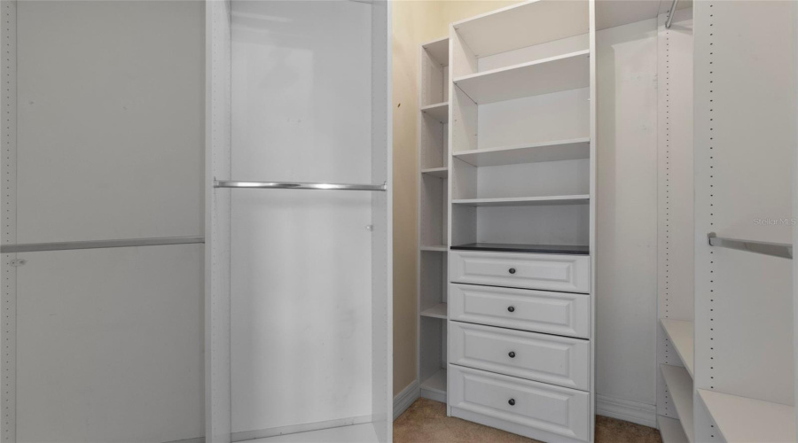 Owner's Walk-In Closet By Design