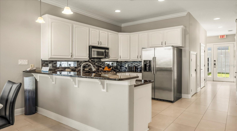 Reunion, Florida 34747, 5 Bedrooms Bedrooms, ,4 Bathroomsbathrooms,Residential,For Sale,Golden Bear,Mfrs5121647