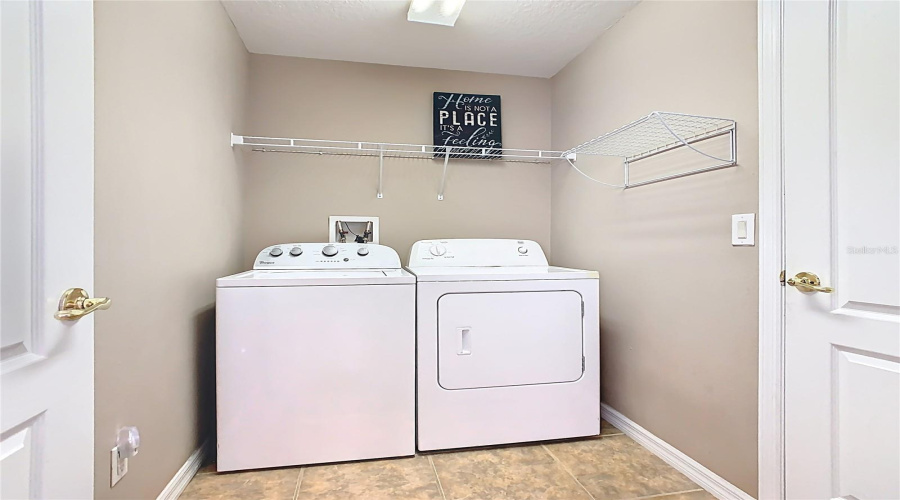 Interior Laundry Room Off The Garage Entrance