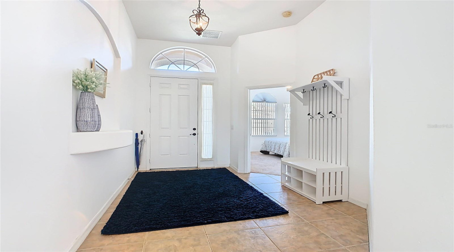 Foyer Is Wide And Open With An Easy Drop Zone. Bedroom With En Suite Off The Entrance.