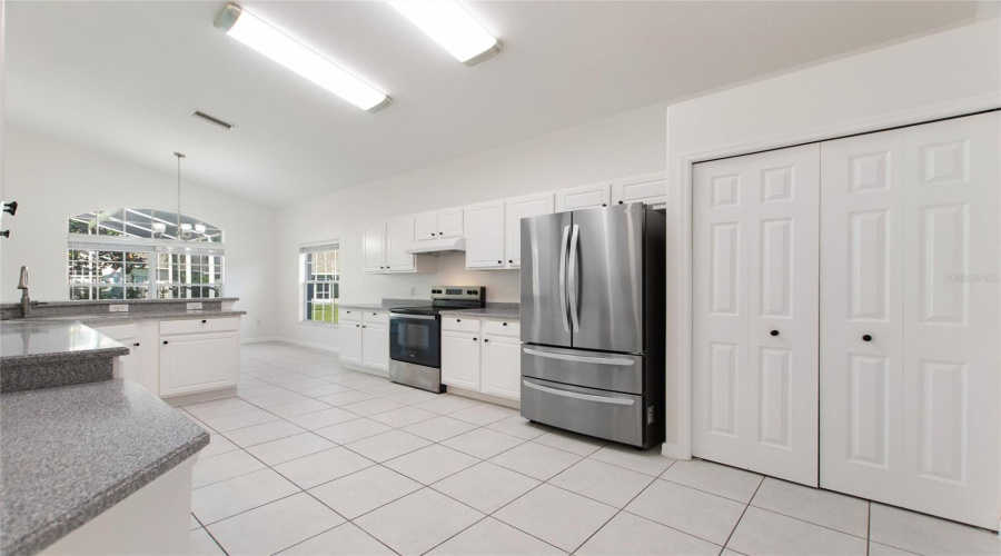 Newer stainless-steel range & refrigerator