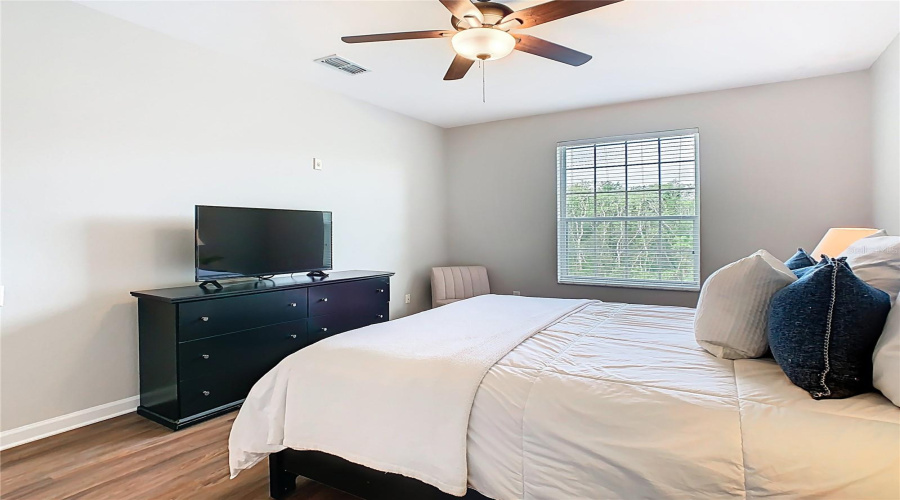 Guest Bedroom 1 – Cozy space for guests.