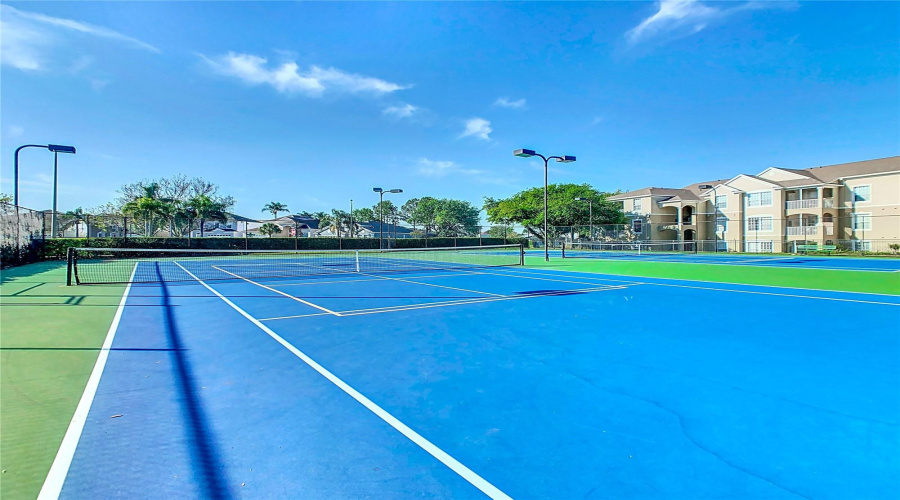 Well-maintained tennis court, perfect for players of all skill levels!