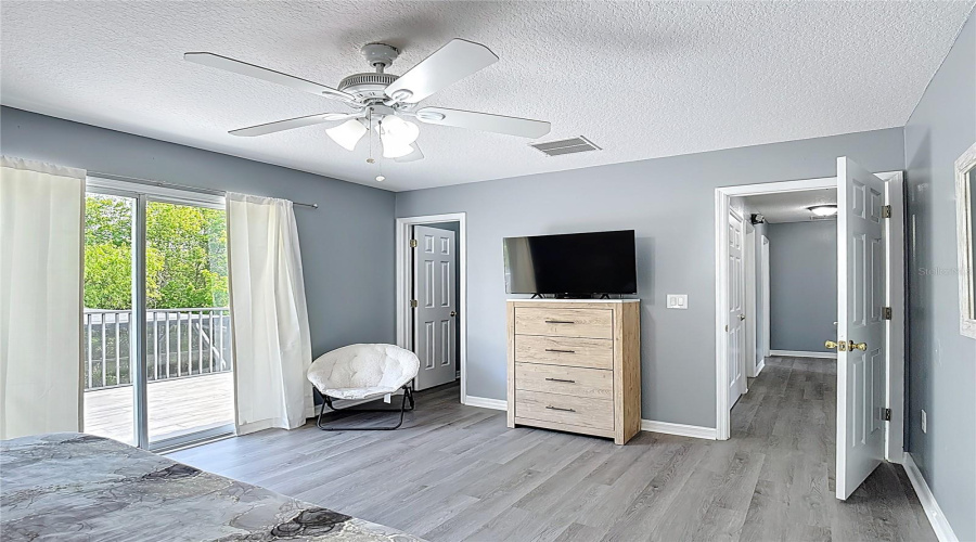 Primary Bedroom with private Balcony (Second Floor)