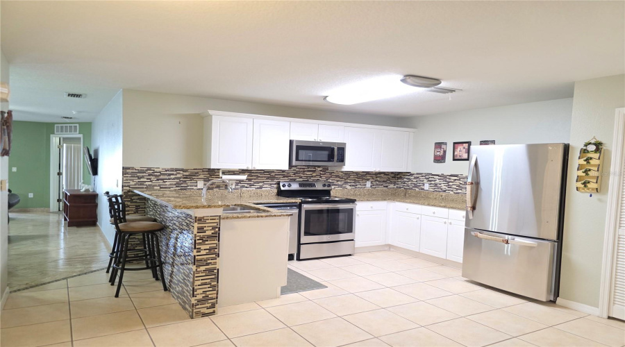 The kitchen can easily accommodate a table.
