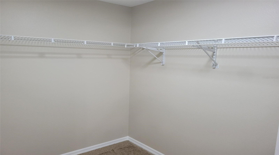Primary Bedroom Walk in Closet