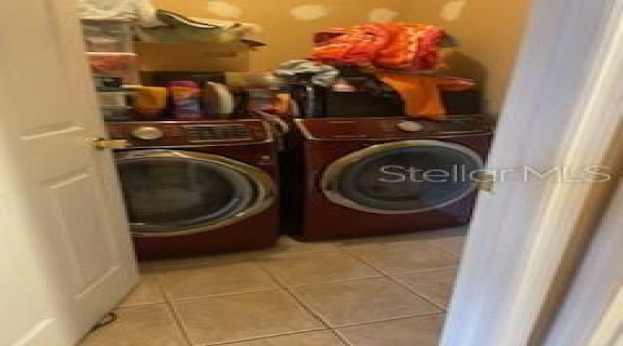 Laundry Room Opens To 2 Car Garage