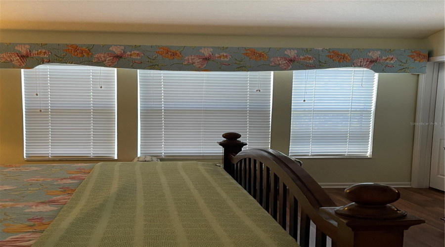 Primary bedroom King bedCornice board and bedding match