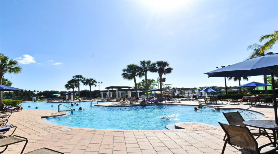 Plenty Of Sitting And Lounging Areas By The Pool
