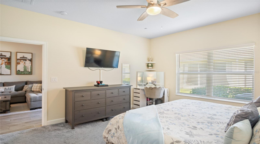 A View Of The Primary Suite Which Faces The Back Yard.