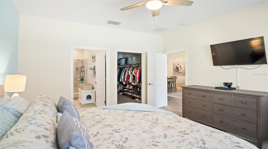 The Primary Suite Looking Toward The Bathroom, Walk-In Closet And Living Area.