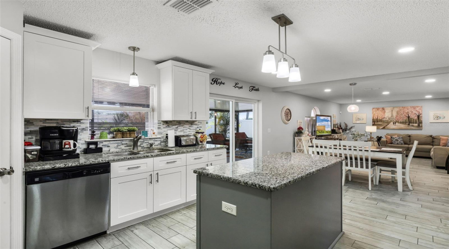 Granite - White Cabinets With Stainless Steel Appliances