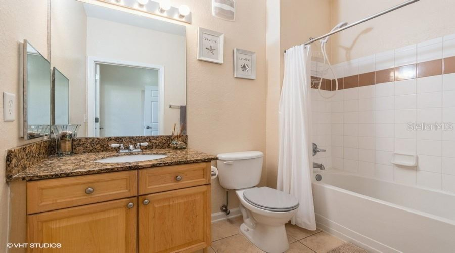 The Second Bathroom Serves As A Full Guest Bath, Providing Comfort And Convenience For Visitors.