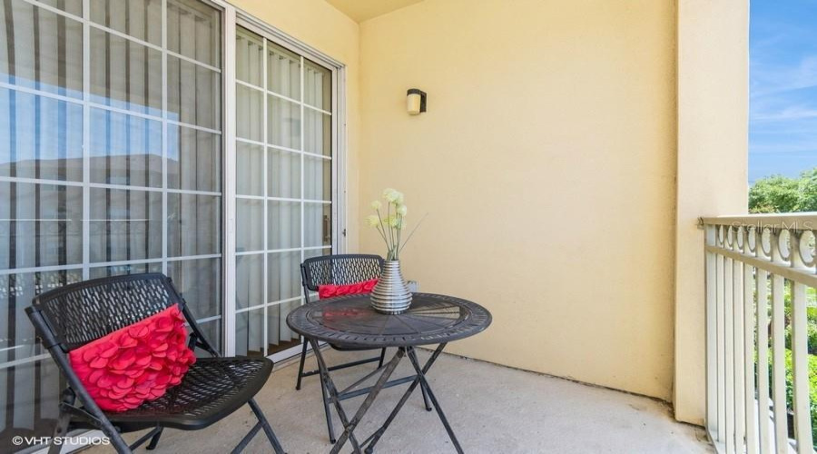 A Cozy Covered Patio Is Just The Right Spot For A Morning Coffee Or Fresh Air.