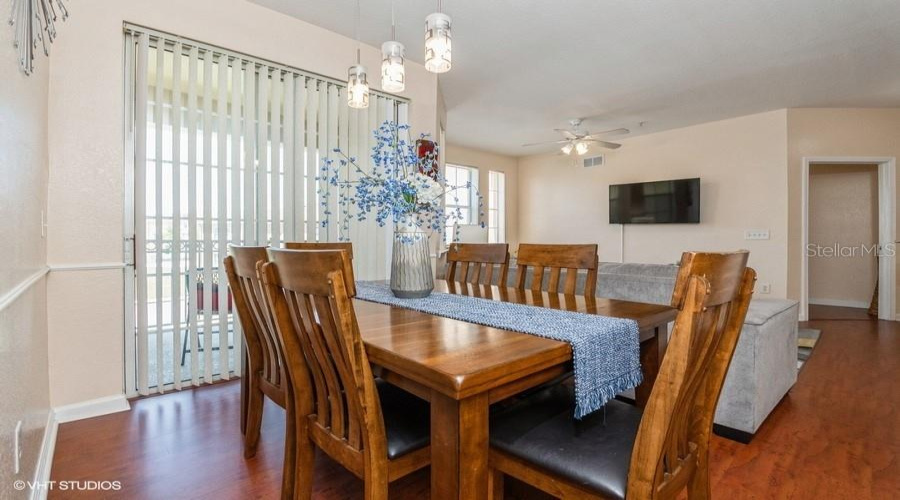The Dining Area Complete With This Full Table And Chairs, Is Perfect For Everyday Meals Or Entertaining Guests.