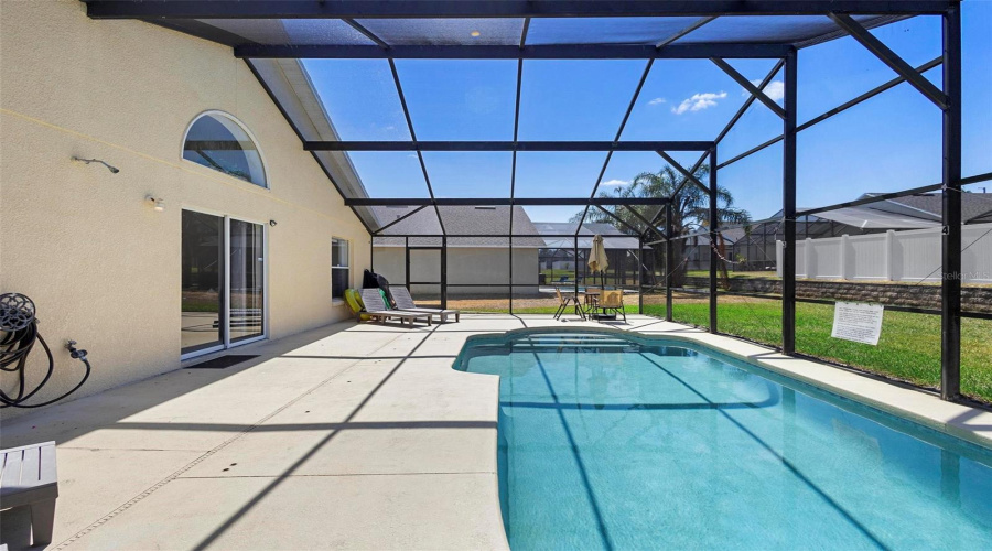 Relax & Unwind In The Screened-In Pool