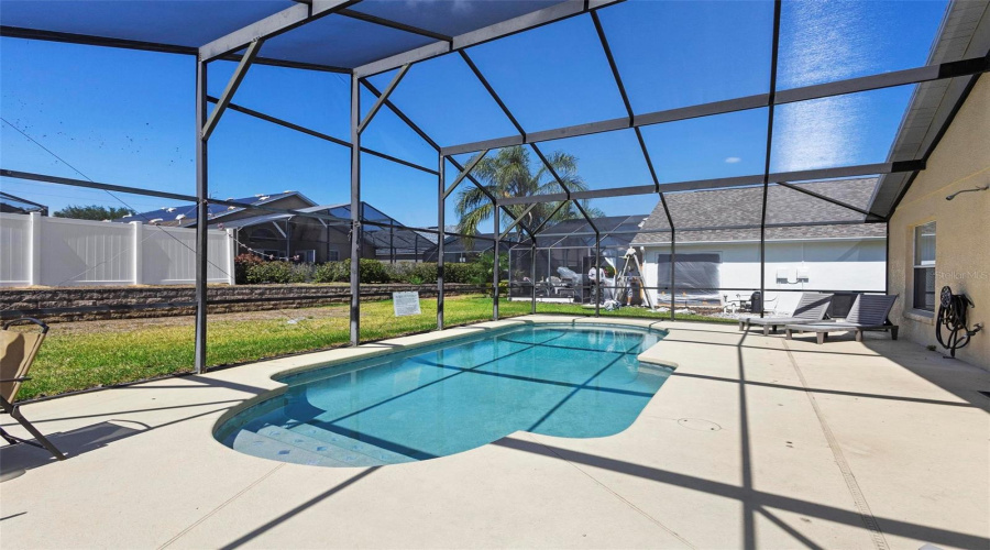 Relax & Unwind In The Screened-In Pool