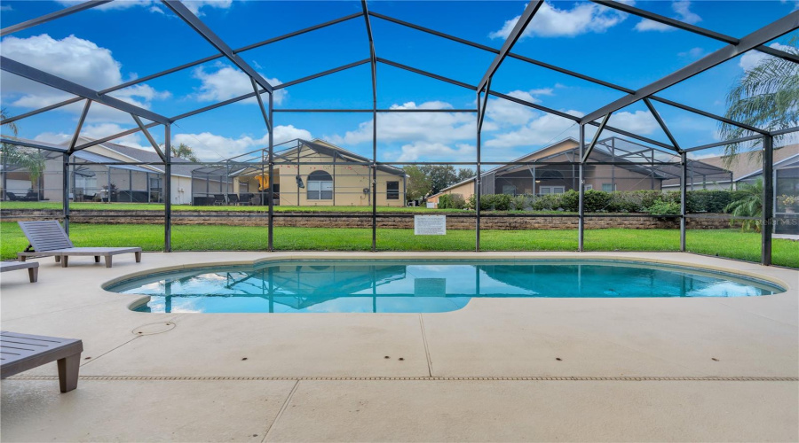 Relax & Unwind In The Screened-In Pool