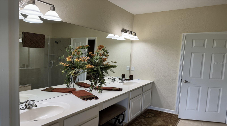Double Sinks And Vanity In The Primary Bath
