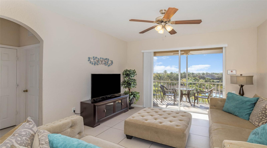 Living Room With Patio, Enjoy Views Of The Pool And Lake!