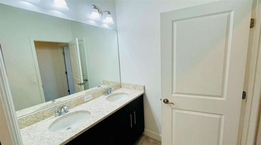 Upstairs Bathroom 3 With Dual Sinks And Shower Tub Combo