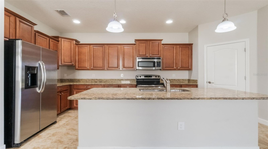 Davenport, Florida 33837, 4 Bedrooms Bedrooms, ,3 Bathroomsbathrooms,Residential,For Sale,Cortland,Mfrs5126618