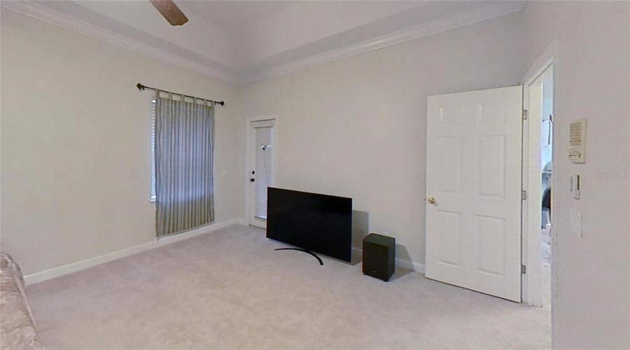 Primary Bedroom With Pool Door.