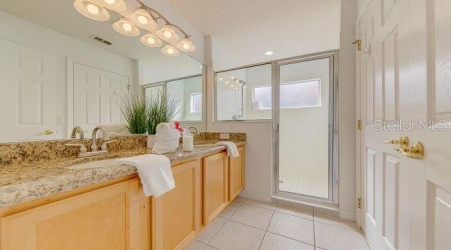 Primary Ensuite With Granite Countertops
