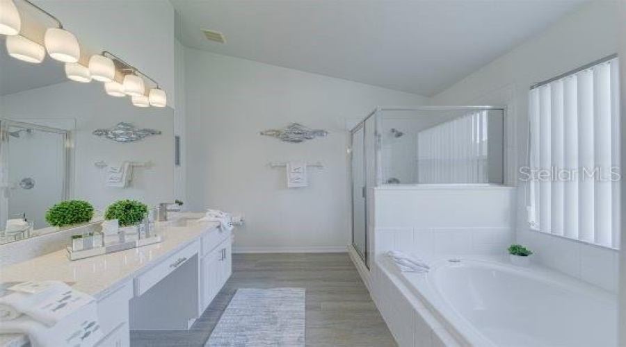 Featuring Garden Tub, Seperate Shower, Quartz Counter Tops, Solid Wood Cabinets, New Toilet And Lighting