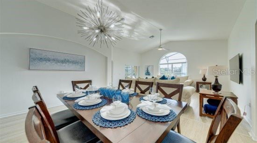 Formal Dining Area In The Heart Of The Home With Modern Light Fixture