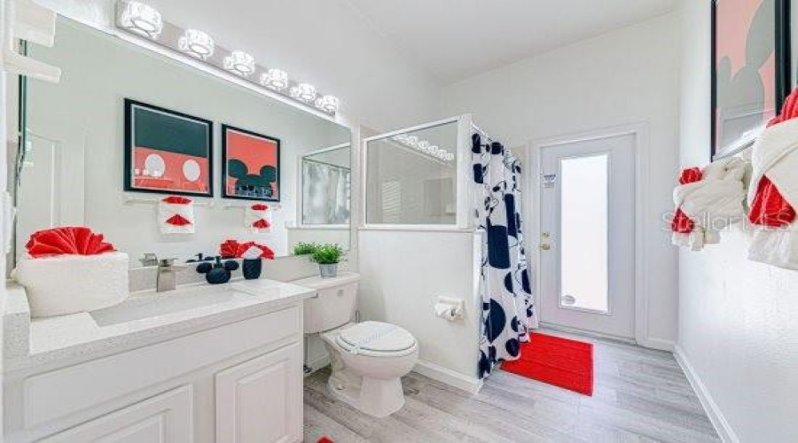 Pool Access And 2Nd Master Ensuite Bathroom, With Sparkle Quartz Bathroom Countertops, Updated Vanity Lighted And Lvp Flooring.