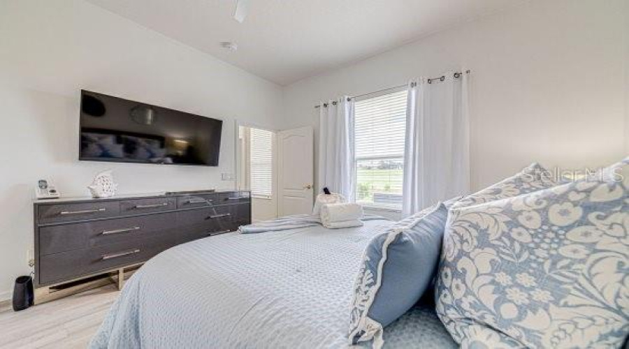 2Nd Master Bedroom With Views Of The Fairway And Ensuite, Plus Built In Closet & Ceiling Fan
