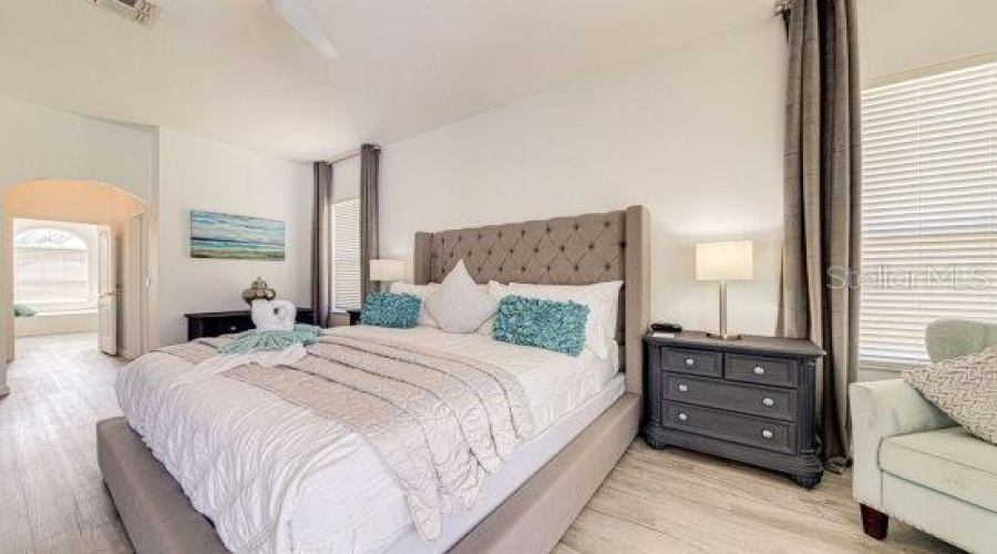 Hallway Between The Bedroom And Ensuite Allows Space For The Walk In Closet And Storage Room/ Additional Closet Space