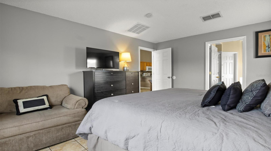 Another view of the primary bedroom