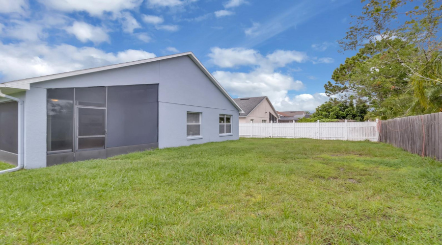 oversized lot and covered and screened lanai